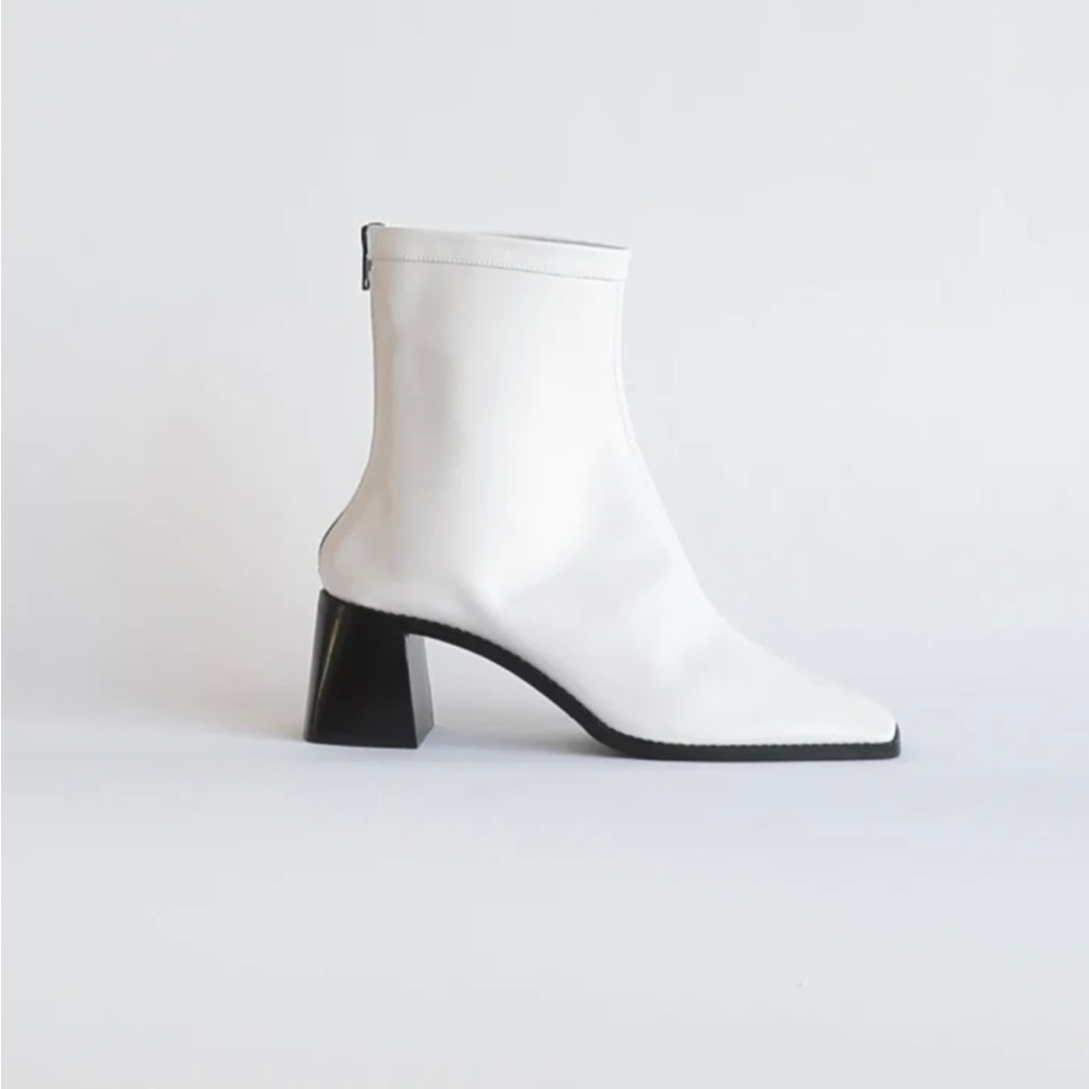 INTENTIONALLY BLANK White Leather Ankle Heeled Boots